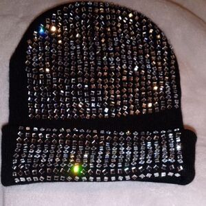 Elegant Black Hat with Silver Embellishments